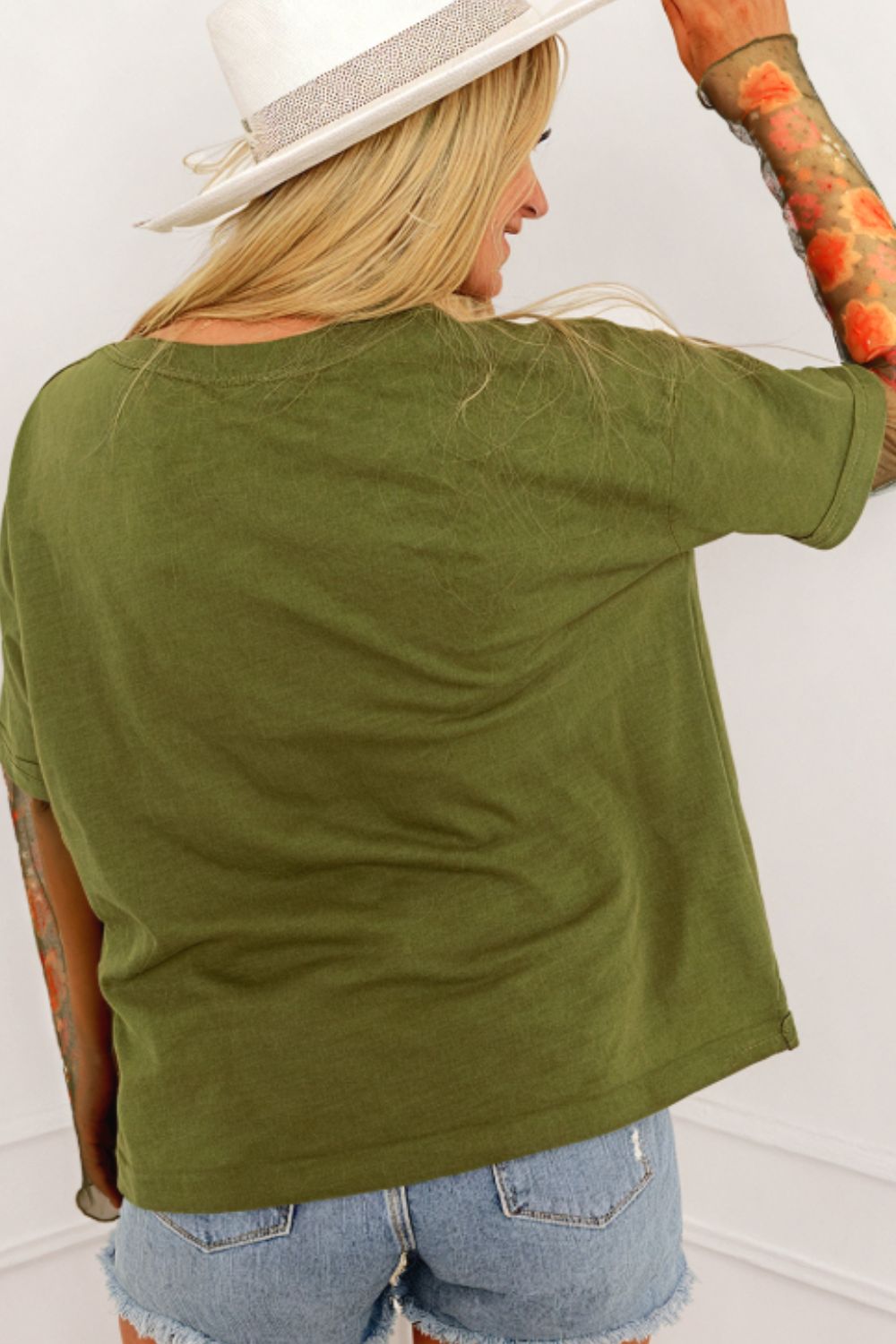 Top de manga larga patchwork floral efecto dos piezas