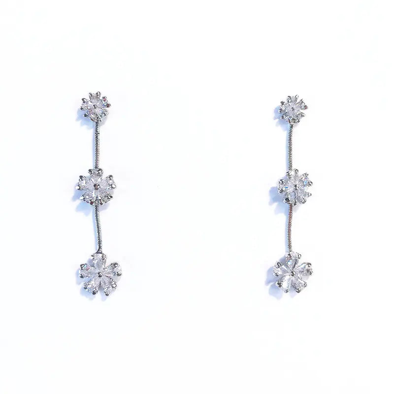 Pendientes largos de copo de nieve con diamantes de imitación y pines de plata 925