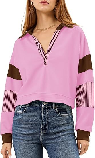 Sudadera corta tipo polo con cuello en V y bloques de color