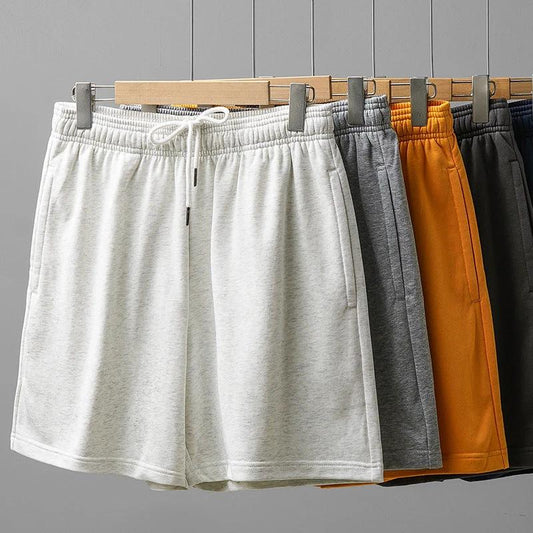 Pantalones cortos deportivos informales transpirables holgados de estilo americano para hombre que combinan con todo