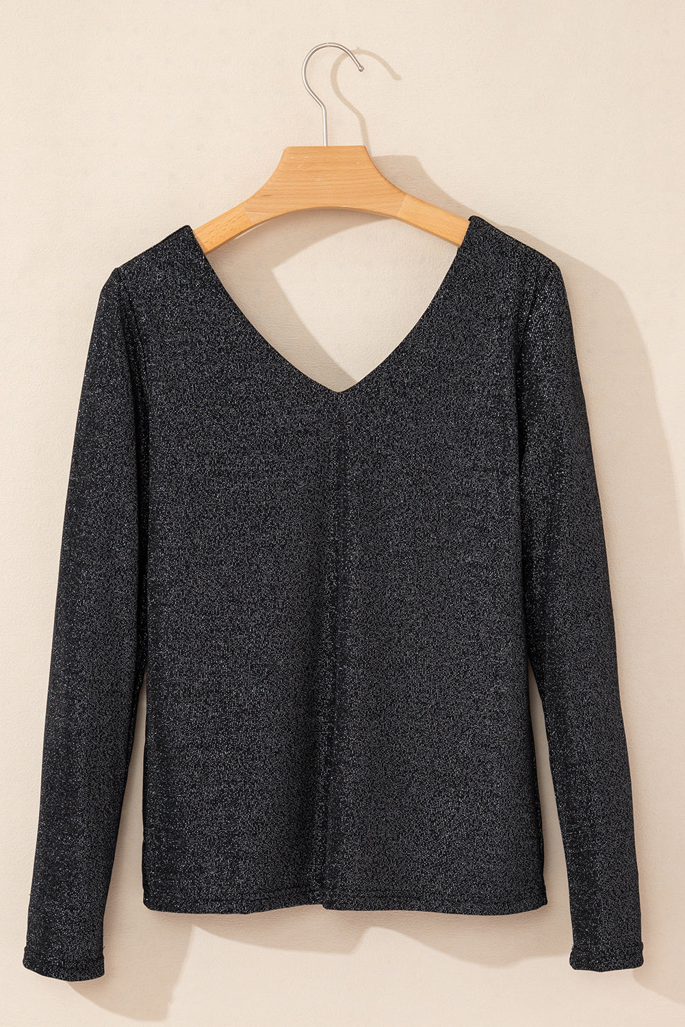 Blusa de manga larga con lazo y cuello en V