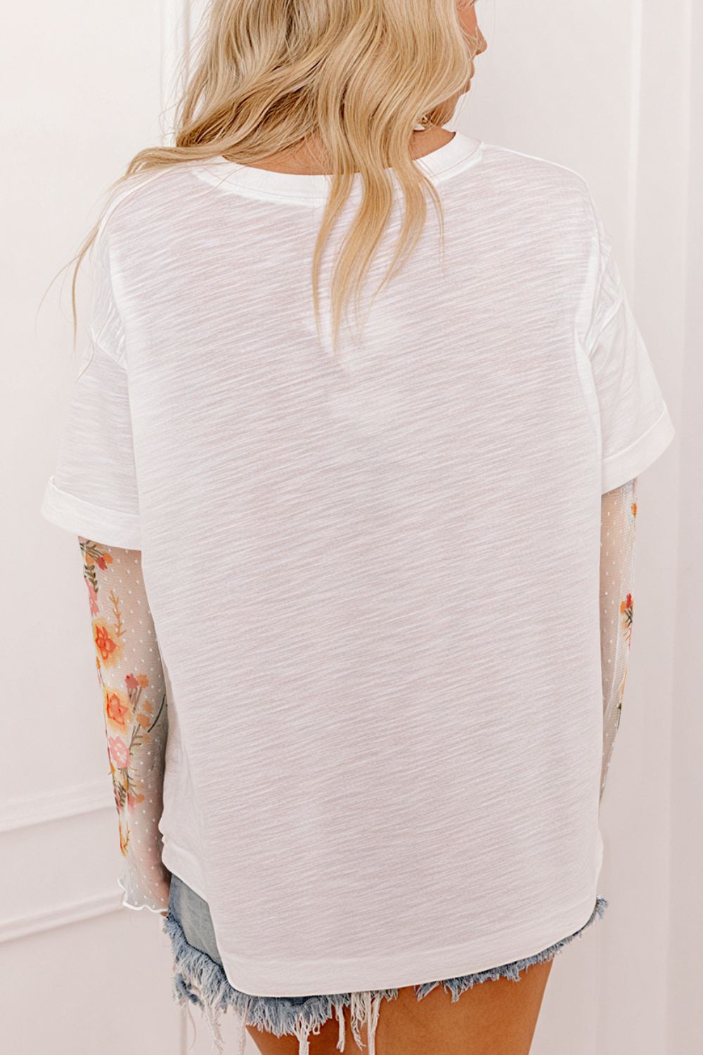 Top de manga larga patchwork floral efecto dos piezas