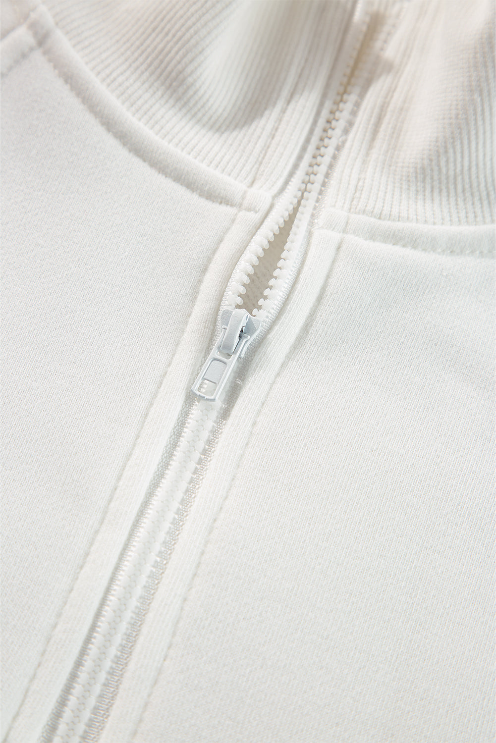 Sudadera lisa fucsia con cremallera y cuello, hombros caídos