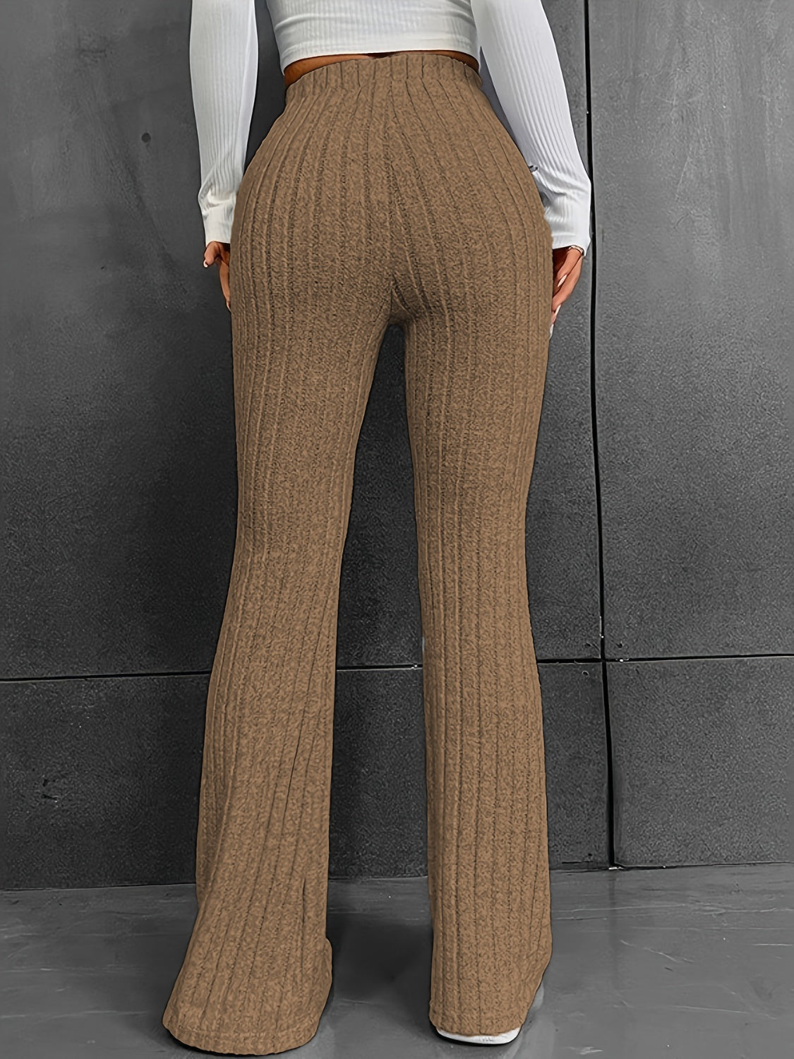 Pantalones acanalados de cintura alta con corte de bota