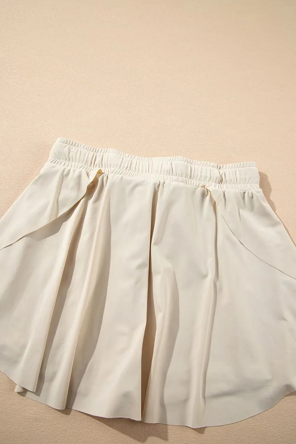 Pantalones cortos deportivos forrados de cintura alta con cordón