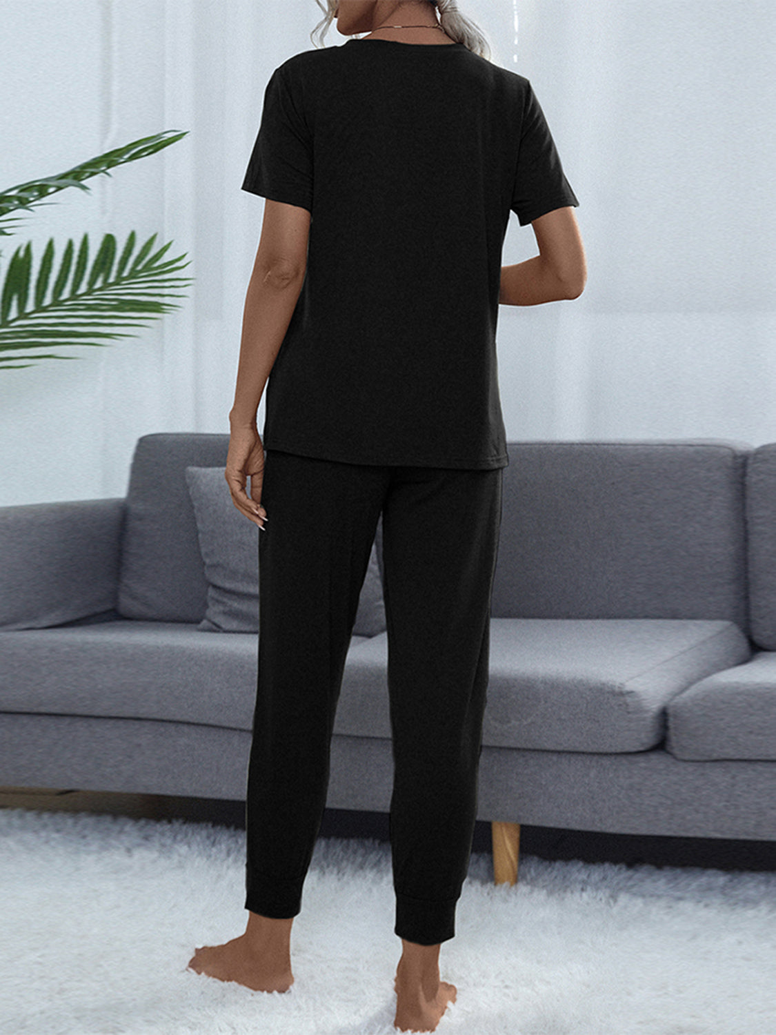 Conjunto de top y pantalón de manga corta con cuello redondo brillante