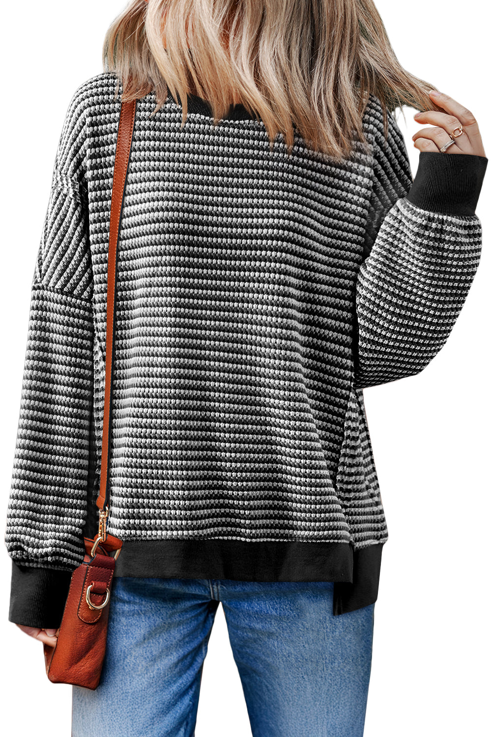 Top oversize de manga larga con hombros caídos, ribete acanalado de rayas negras