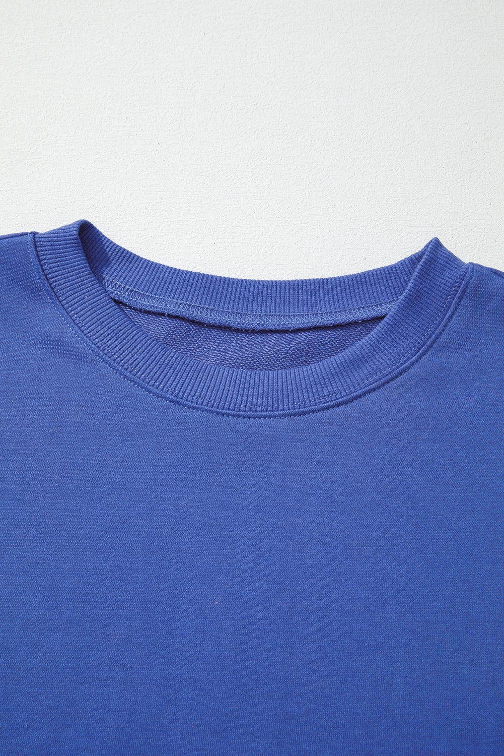 Sudadera Oversize Azul Cielo con Detalle de Rayas Universitarias y Hombros Caídos