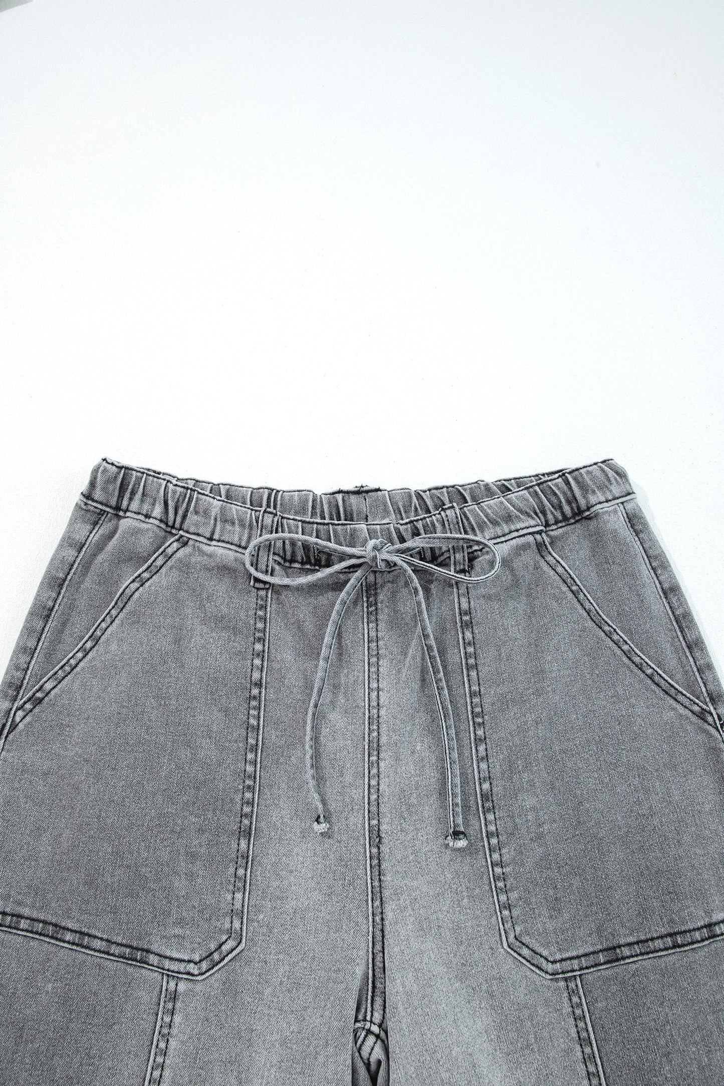 Pantalones vaqueros de pierna ancha con cordón azul de Prusia, detalle de costura y dobladillo sin rematar