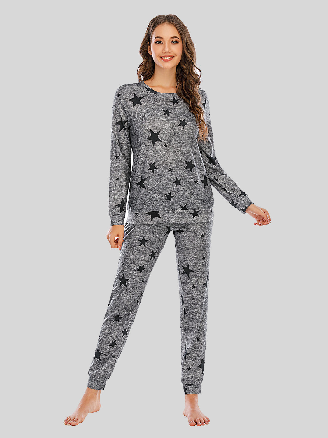 Conjunto de pijama de top y pantalón con estrellas