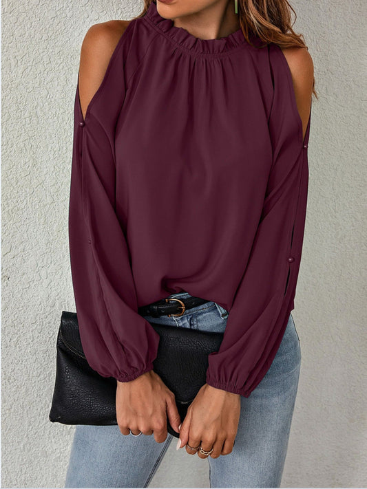 Blusa con volantes en el cuello y hombros descubiertos
