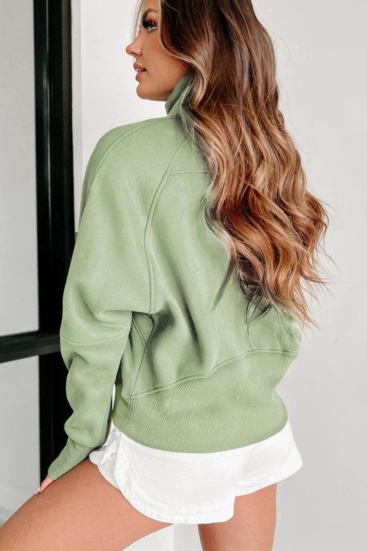Sudadera de cuello medio con cremallera y forro polar liso
