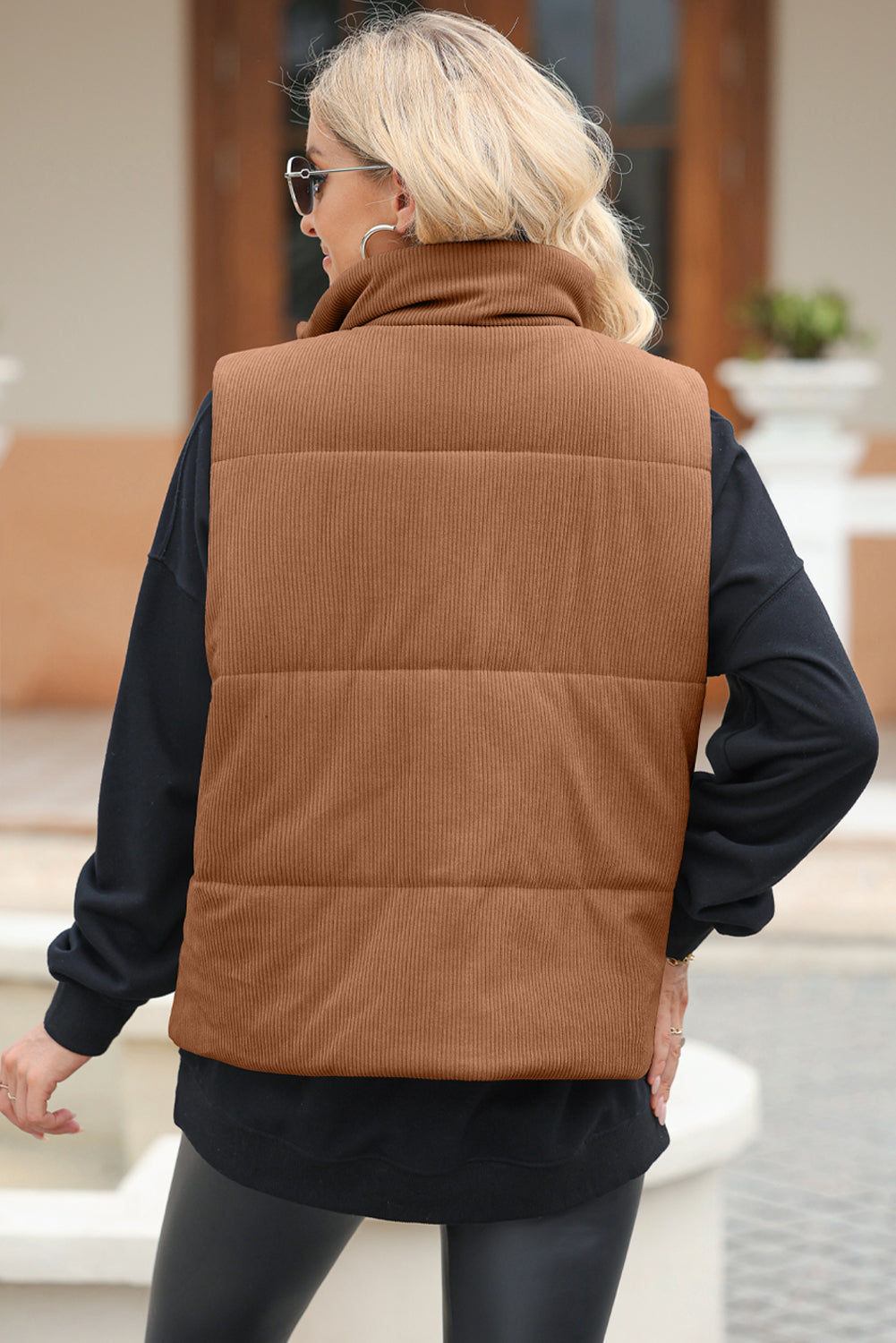 Chaleco abrigado de cuello alto con cremallera y bolsillos