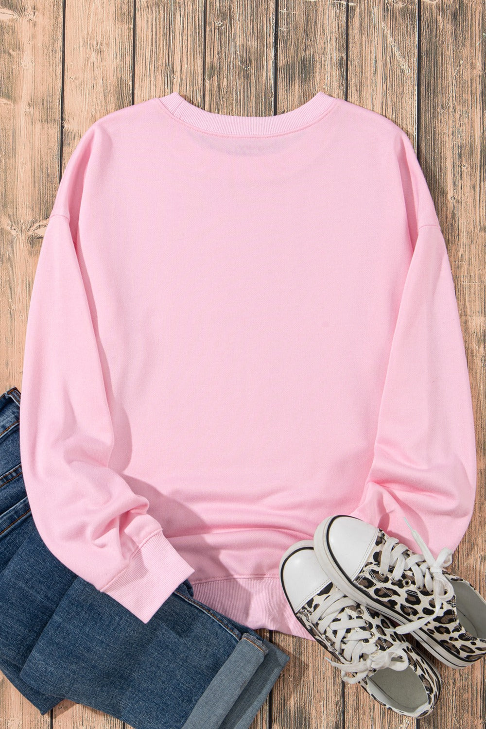 Sudadera de cuello redondo y manga larga con gráfico de lazo