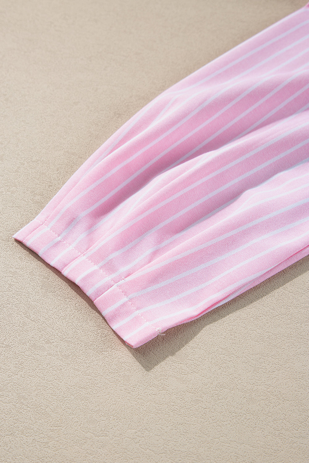Blusa de cuello redondo a rayas con lazo