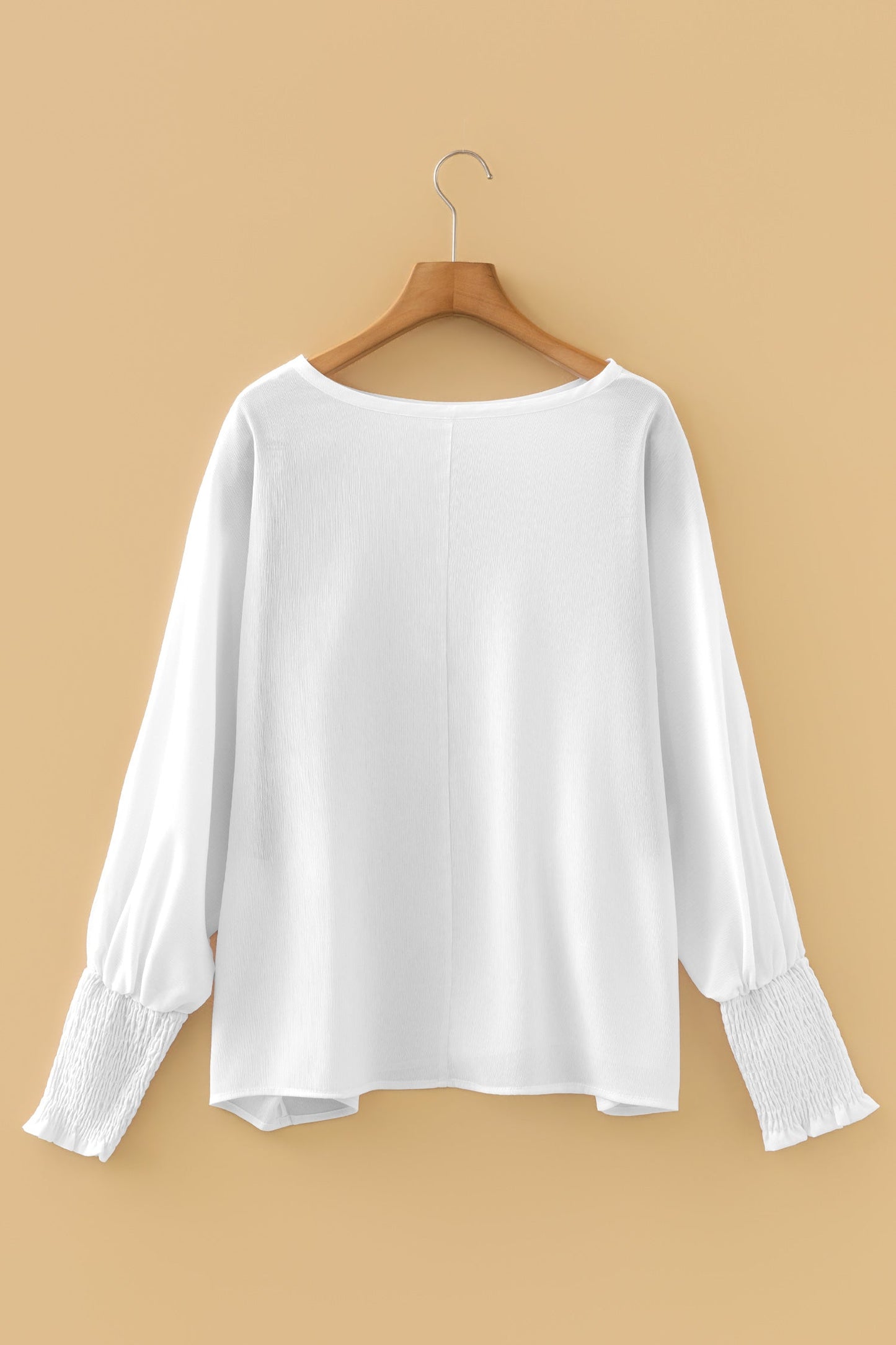 Blusa dolmán de manga larga semitransparente con puños blancos fruncidos