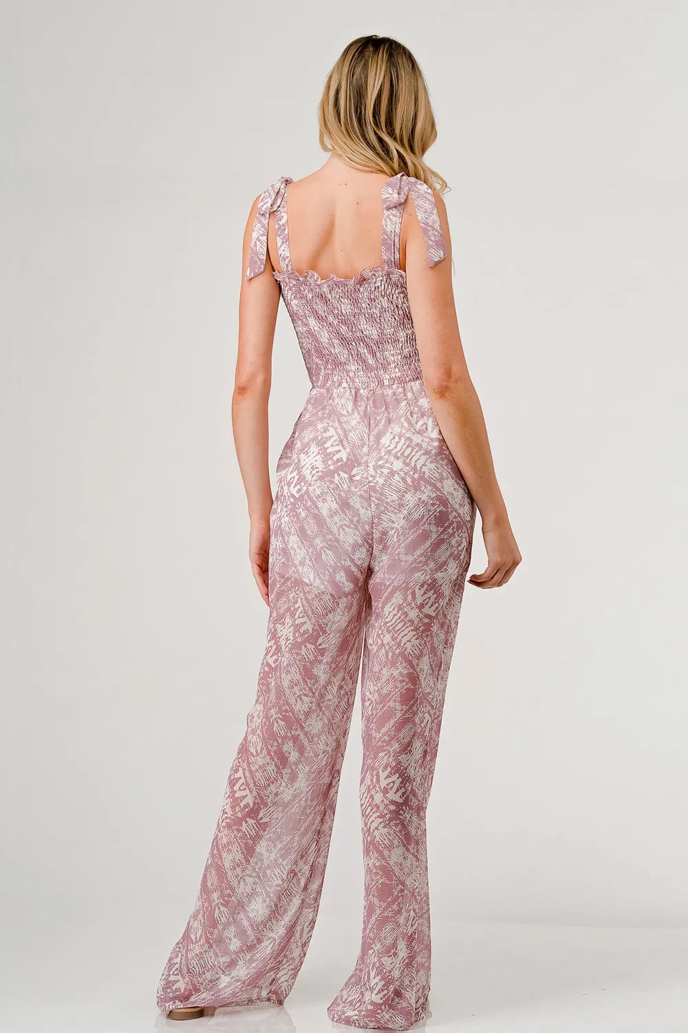 Mono de pernera ancha con estampado GeeGee y tirantes para anudar al hombro