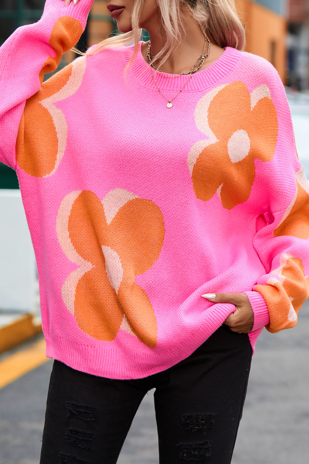 Suéter holgado con estampado floral