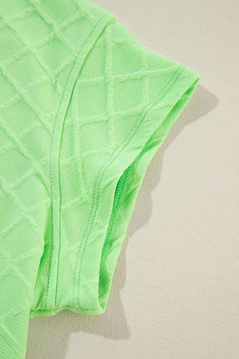 Camiseta texturizada a cuadros verde claro y shorts con cordón