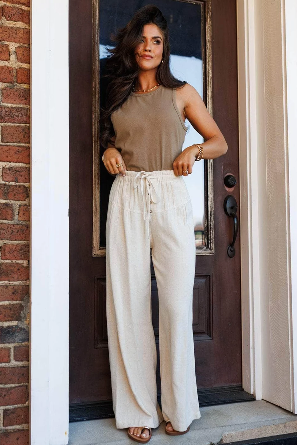 Pantalones anchos Jet Stream con cintura elástica con cordón y detalles plisados con botones