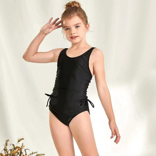 Bikini de una pieza con pliegues y lazo, de color liso