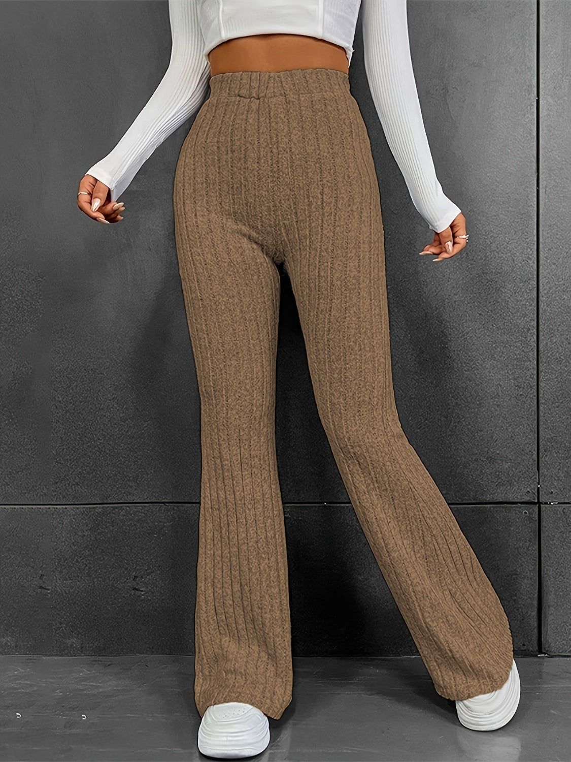 Pantalones acanalados de cintura alta con corte de bota
