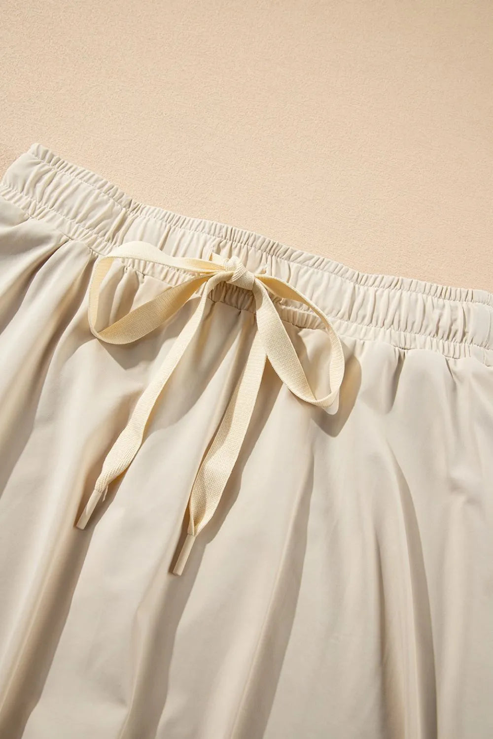 Pantalones cortos deportivos forrados de cintura alta con cordón