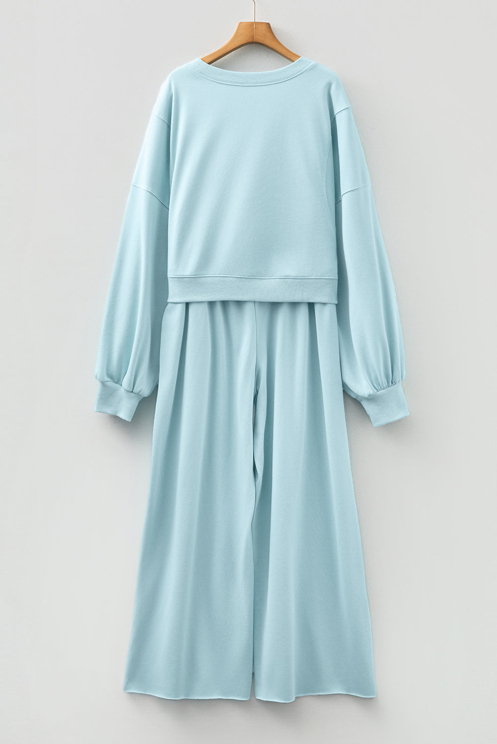 Conjunto de pantalón de pernera ancha con cordón y jersey corto de manga abullonada de hombro caído en azul niebla