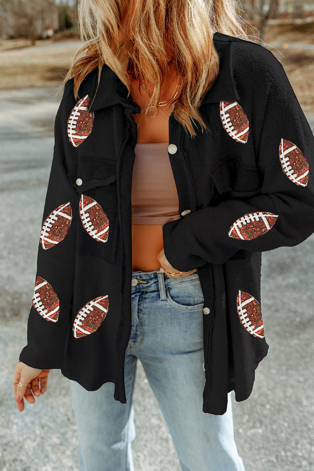 Chaqueta camisera negra de lana con estampado de fútbol y botones en la parte delantera