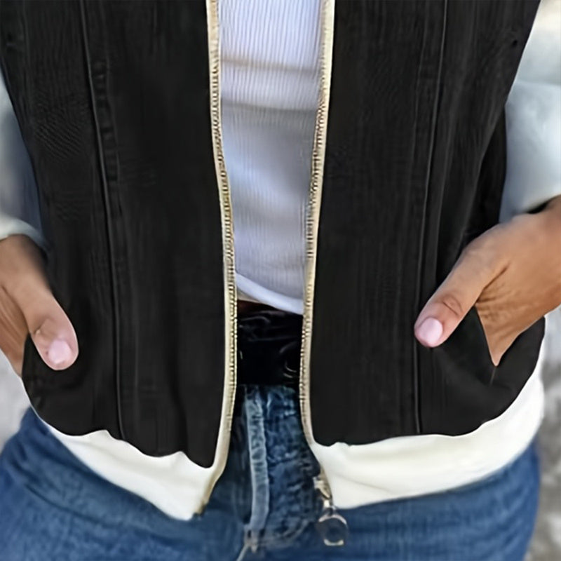 Chaqueta vaquera con cremallera y retales para mujer