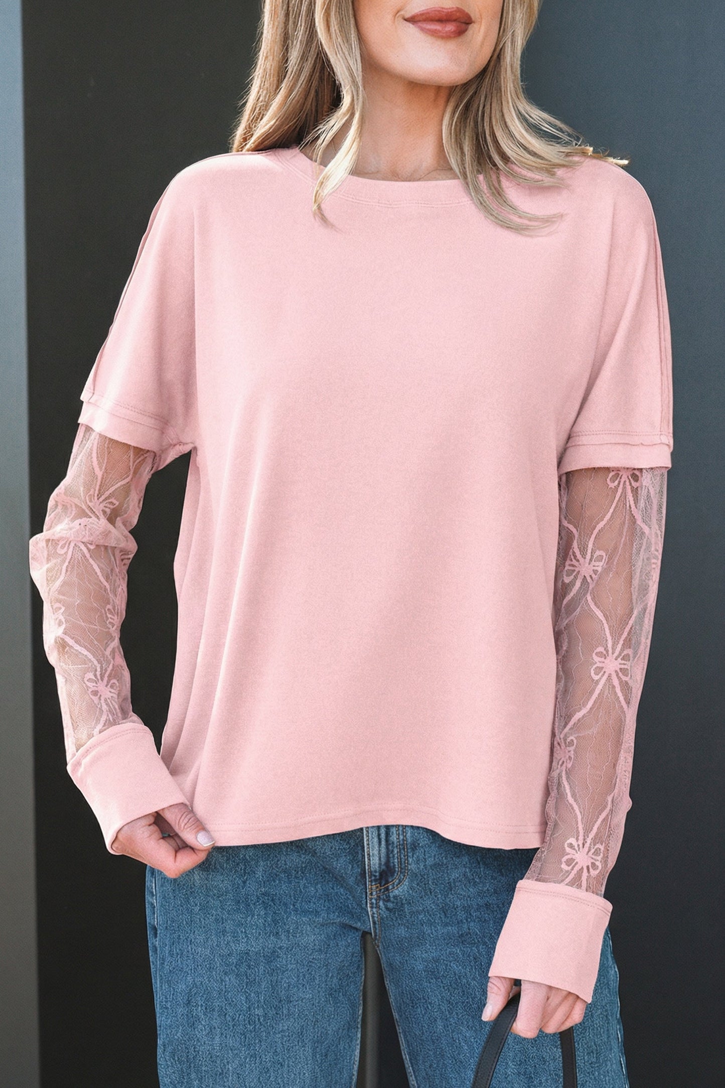 Camiseta de manga larga con retazos texturizados y lazo, color rosa claro liso