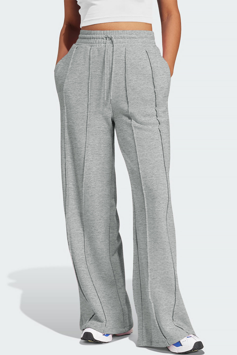 Pantalón de chándal gris de pernera ancha, talle alto, con cordón y costuras