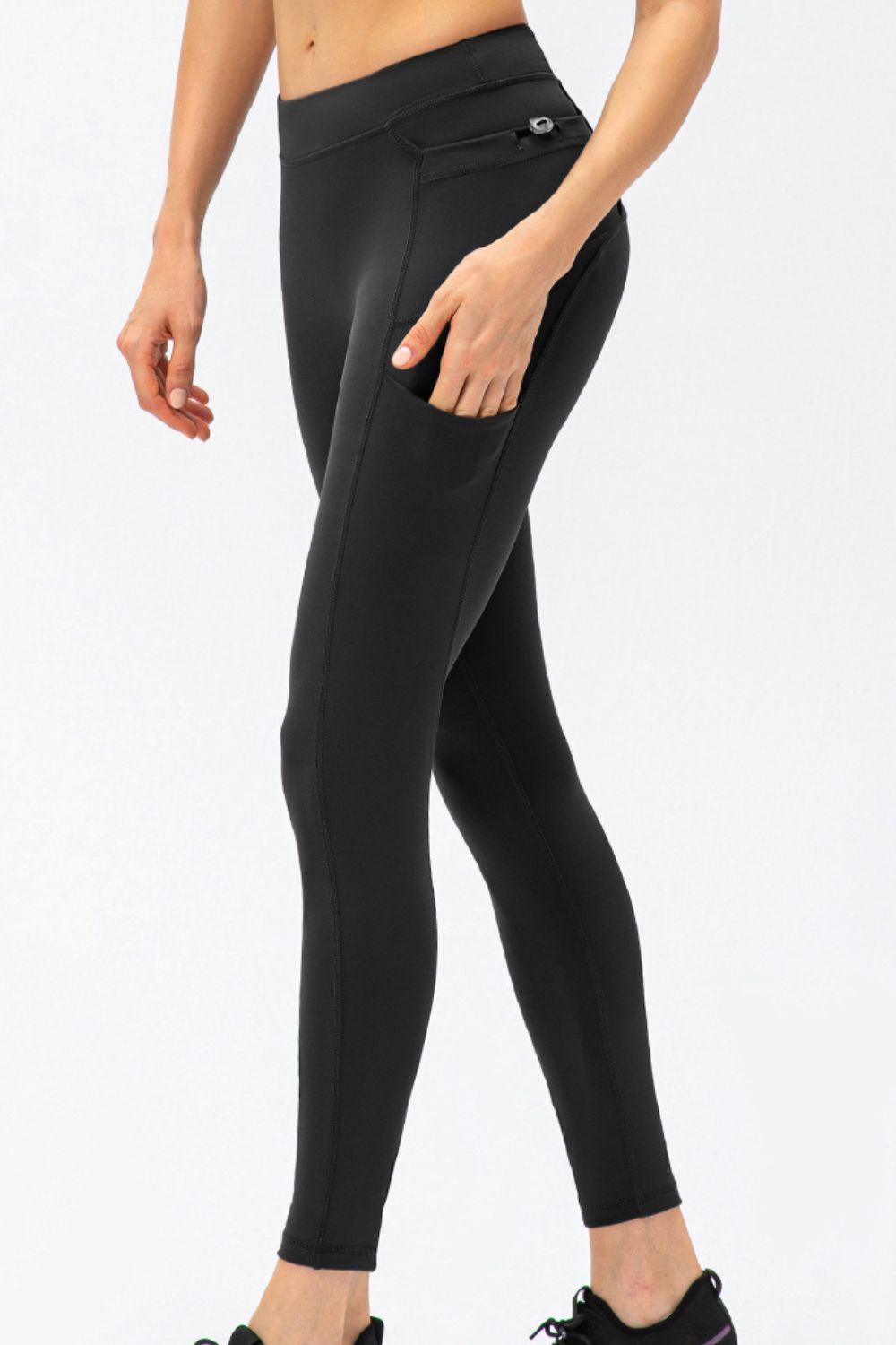 Pantalones deportivos largos de talle alto y corte entallado con bolsillos