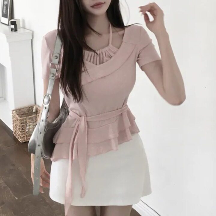 Design-forward Top With An Irregular Ruffled Hem