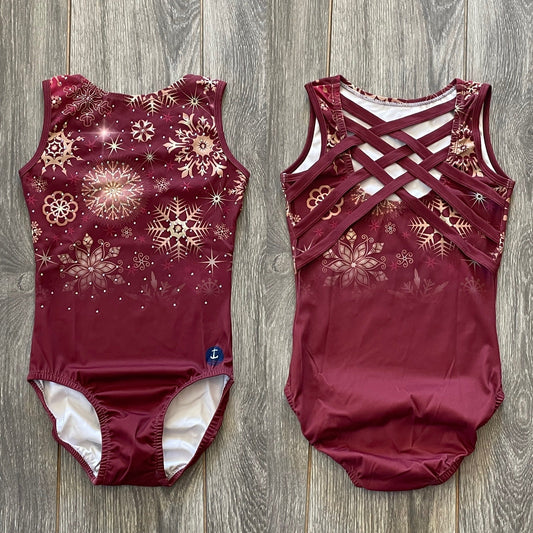 Maillot con lentejuelas, arándanos y copos de nieve dorados