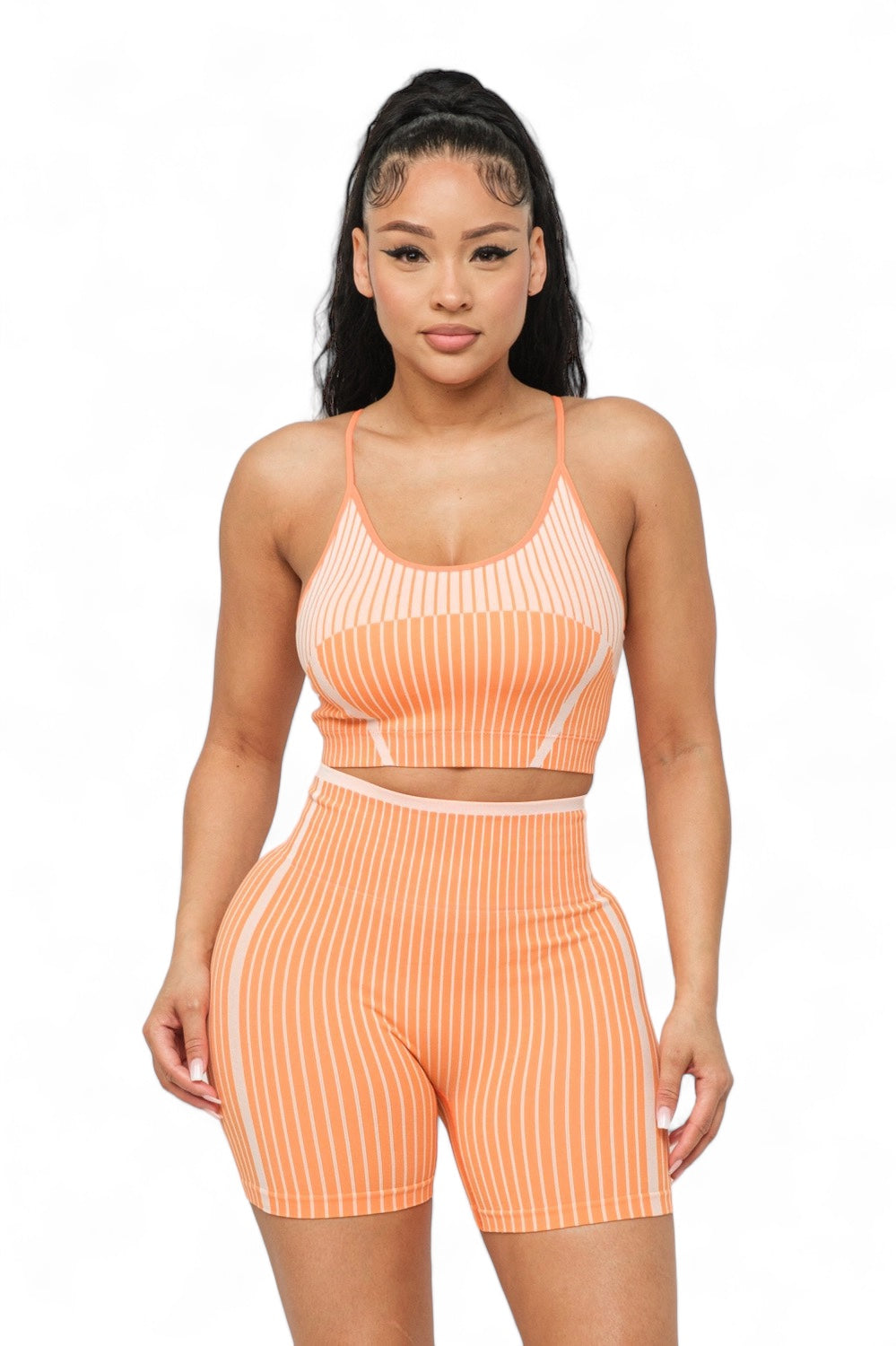 Conjunto de top sin costuras a rayas y pantalón corto de ciclista