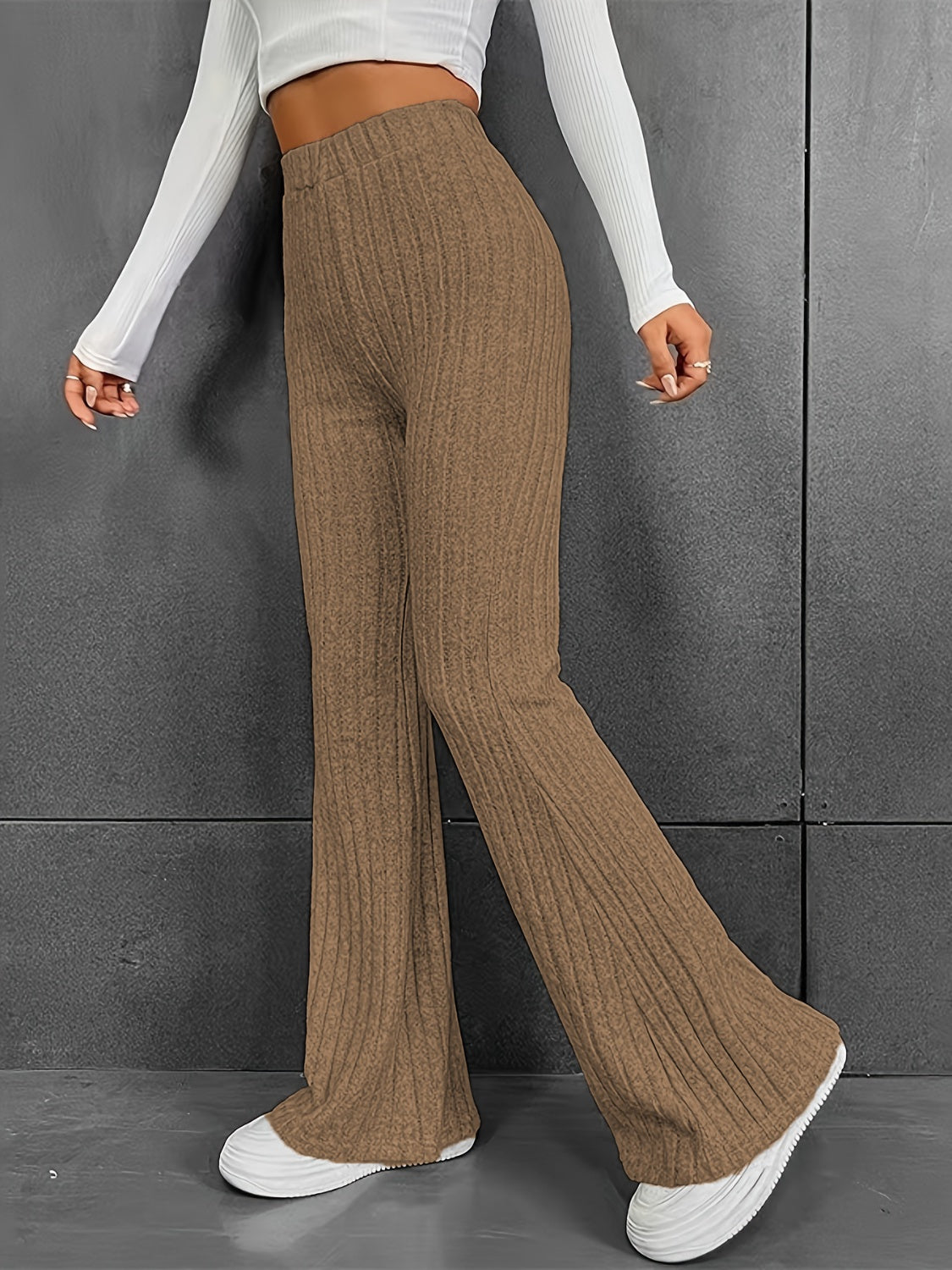 Pantalones acanalados de cintura alta con corte de bota
