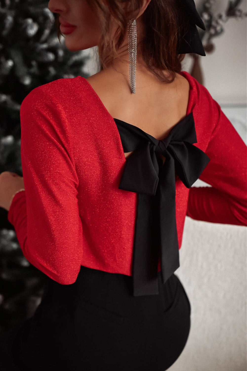 Blusa de manga larga con lazo y cuello en V