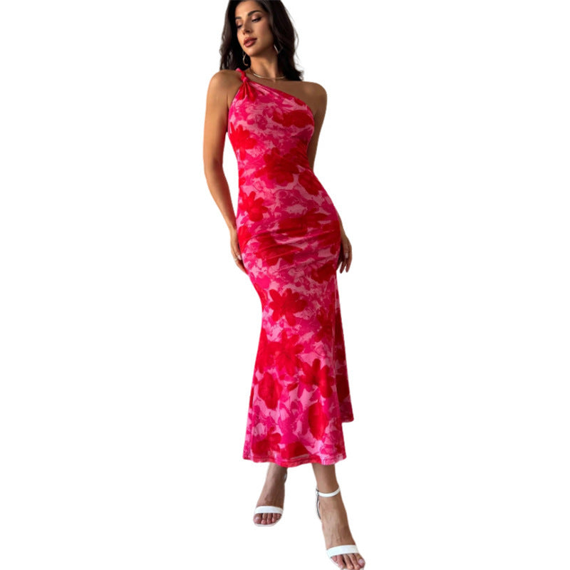 Vestido de mujer estilo europeo y americano con estampado de patrón irregular, tirantes y hombros.