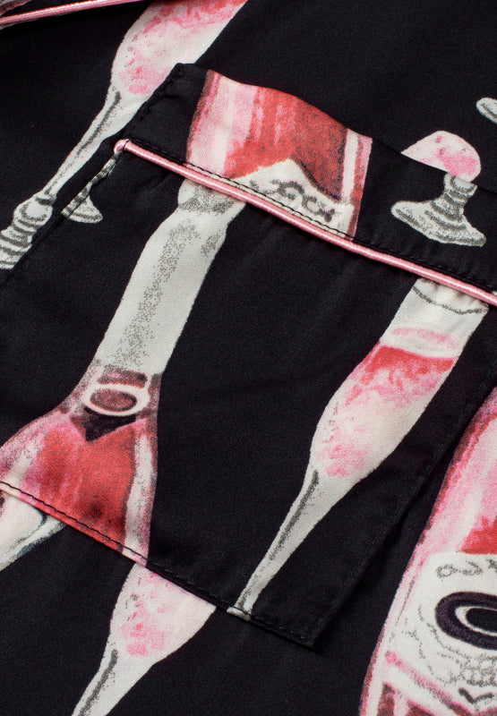 Conjunto de top de manga corta y shorts con estampado de champán