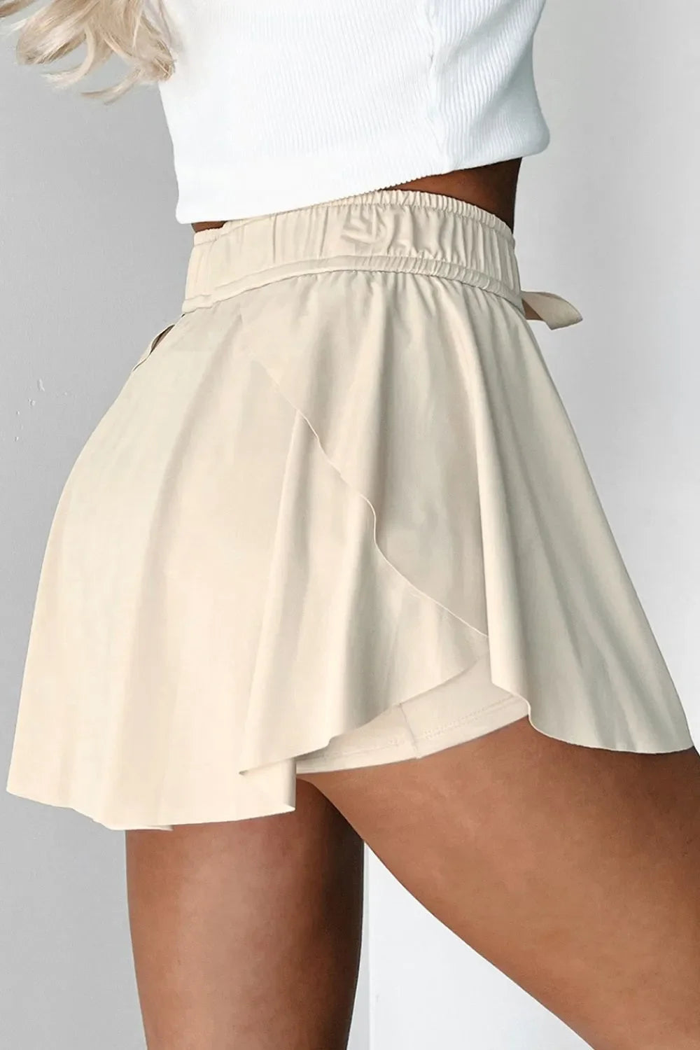 Pantalones cortos deportivos forrados de cintura alta con cordón
