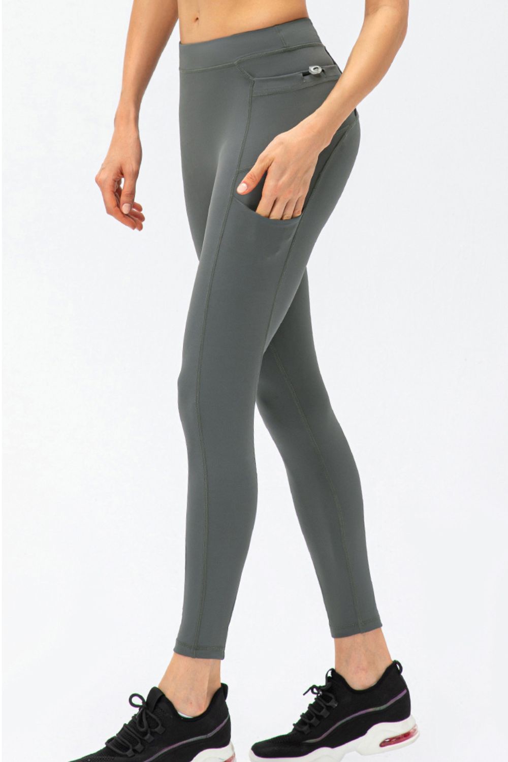 Pantalones deportivos largos de talle alto y corte entallado con bolsillos