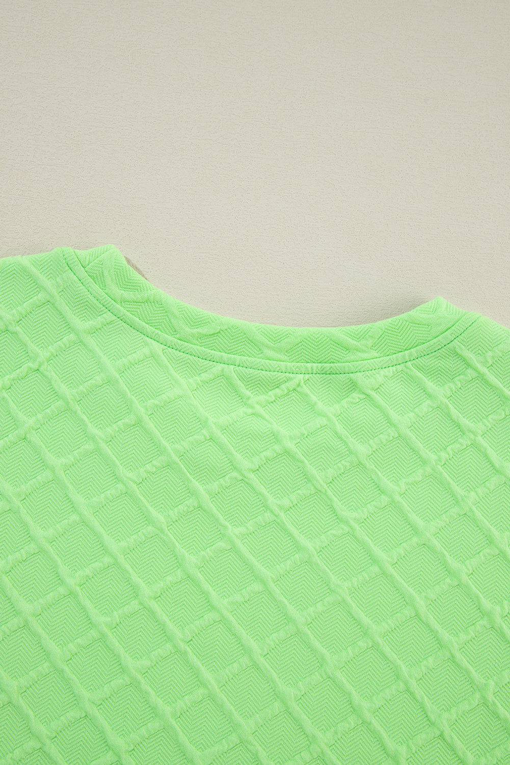 Camiseta texturizada a cuadros verde claro y shorts con cordón