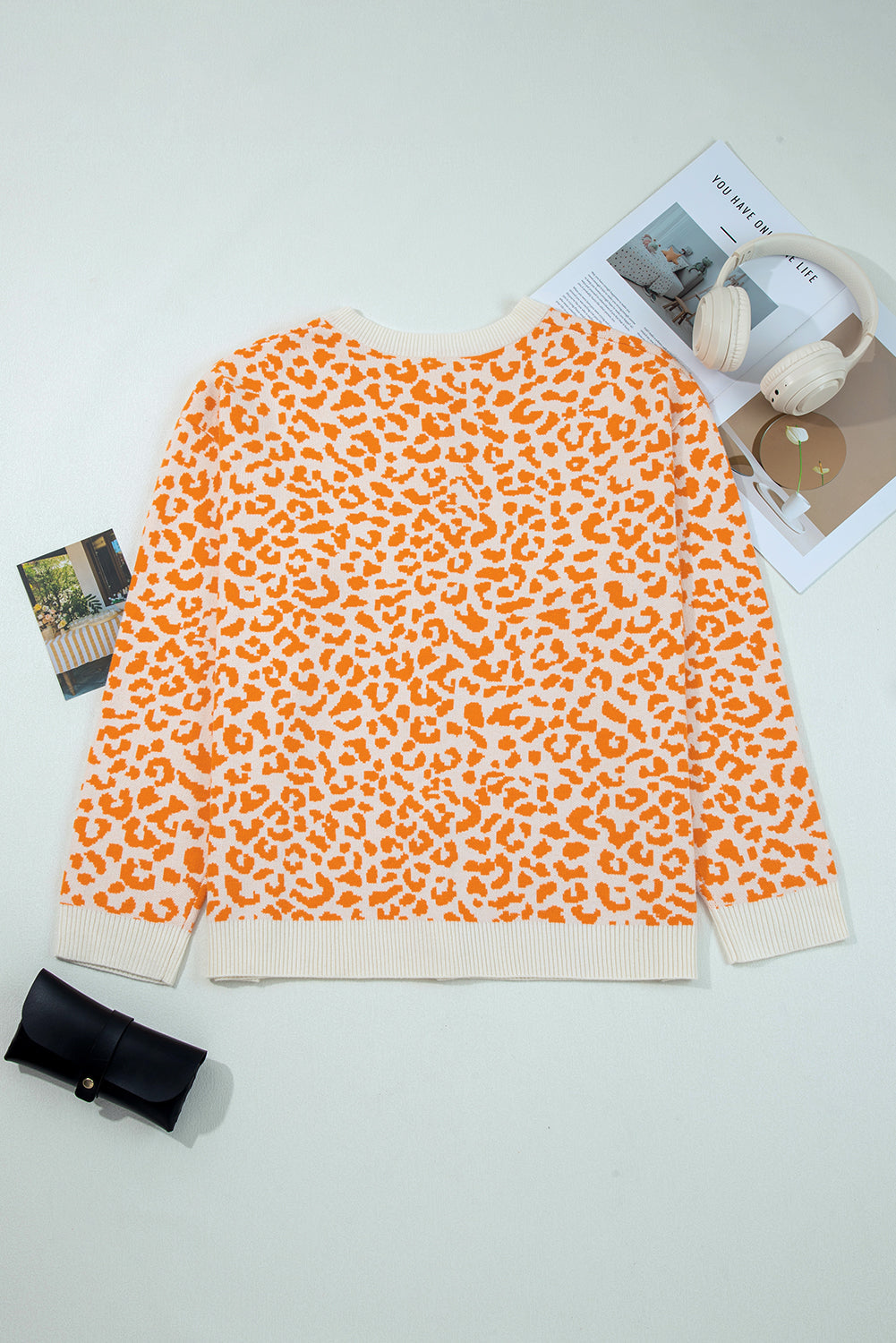 Cárdigan de punto de hombros caídos con estampado de leopardo naranja