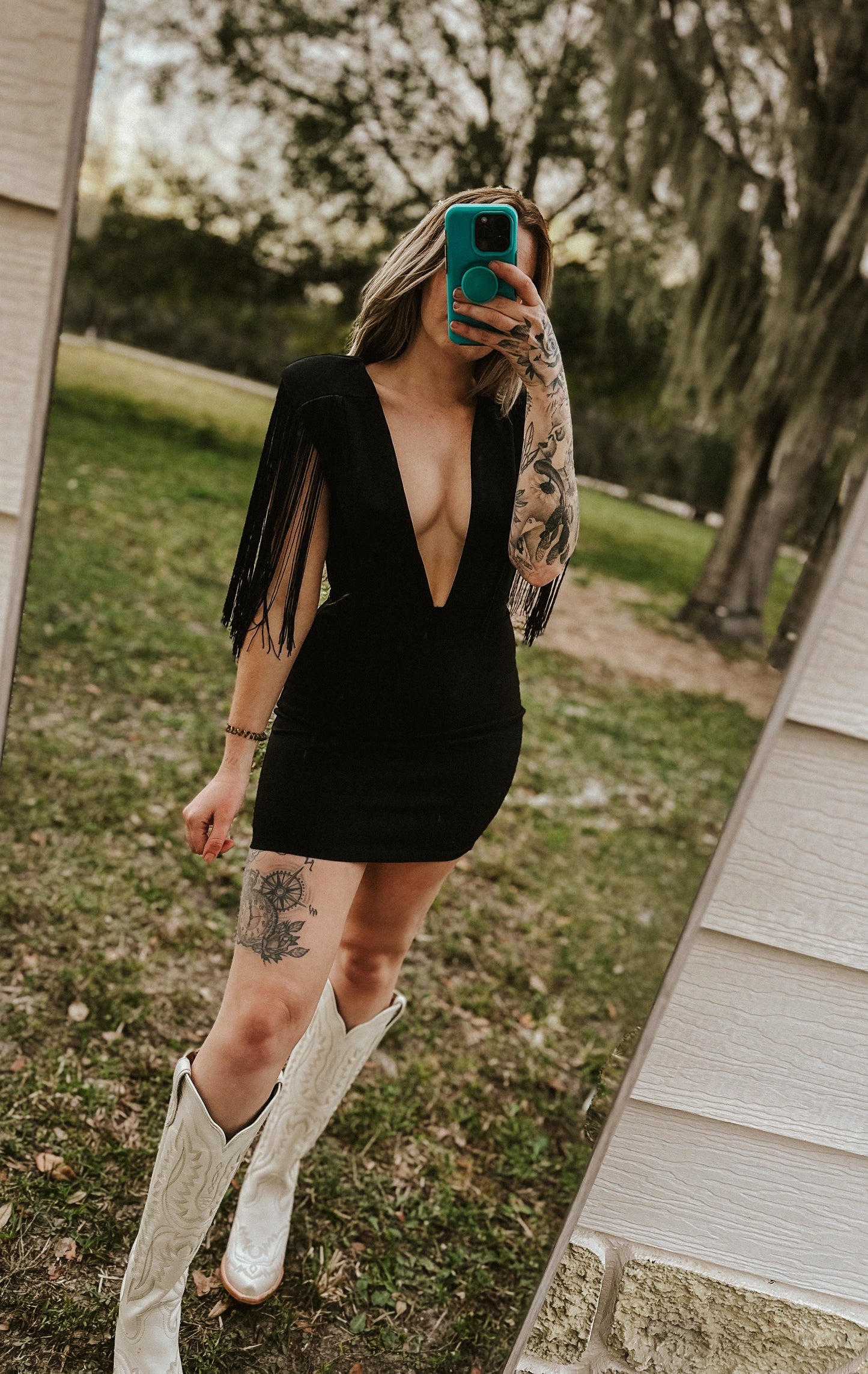 Dallas' Fringe Deep Neck Mini Dress