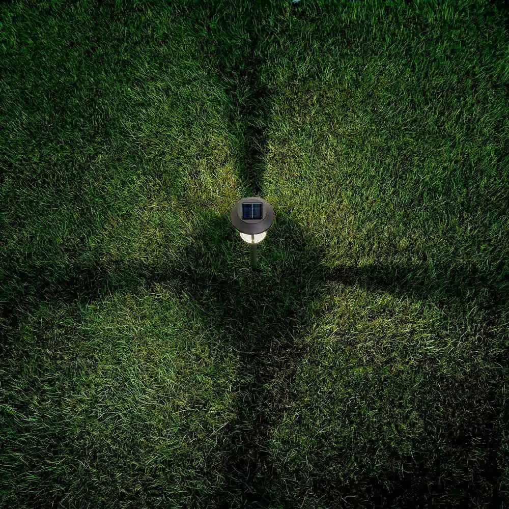 Paquete de 4 luces LED solares doradas para exteriores - Iluminación resistente a la intemperie para caminos y jardines