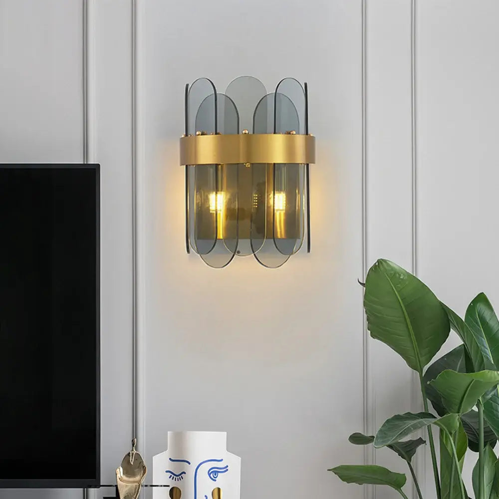 Lámpara de pared de cristal ovalada dorada