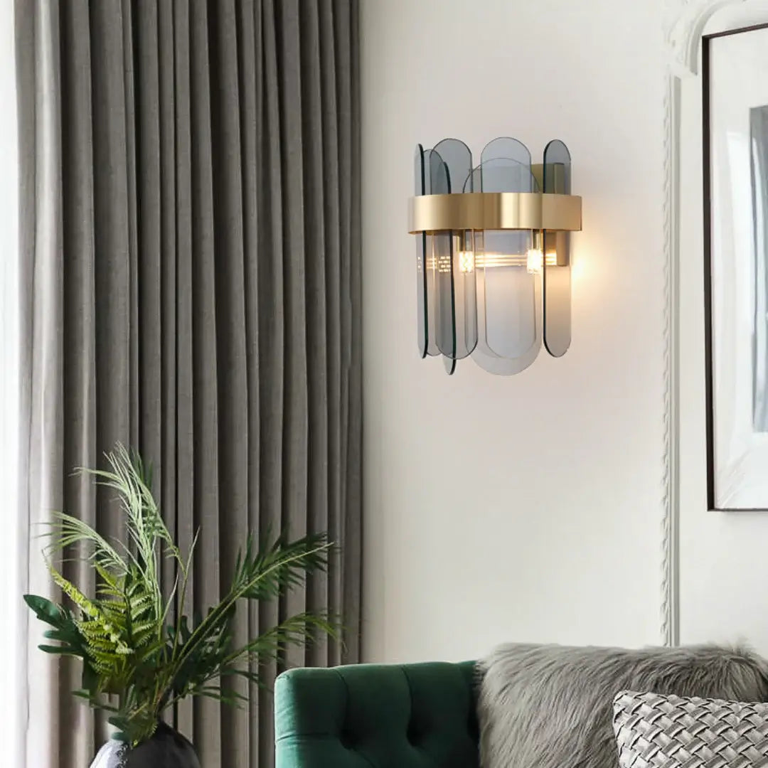Lámpara de pared de cristal ovalada dorada