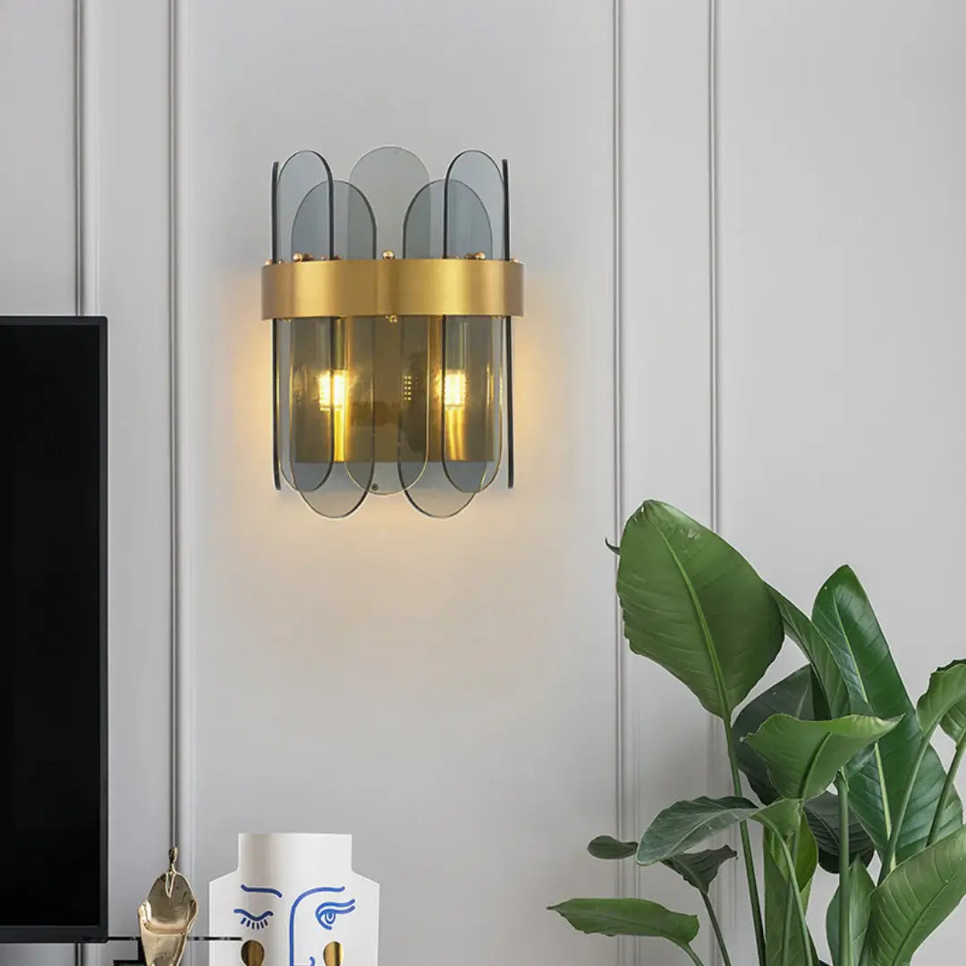 Lámpara de pared de cristal ovalada dorada