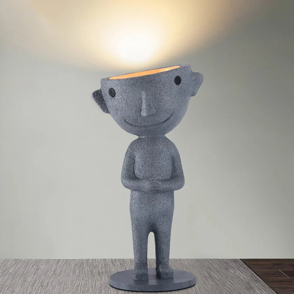 Lámpara de pie con estatua alienígena